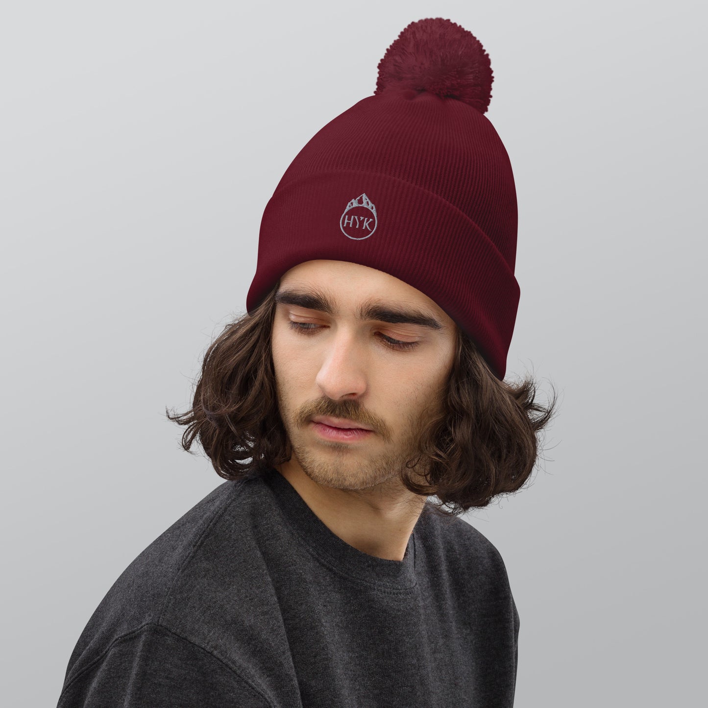 high quality embroidered pom beanie for hiking and outdoors